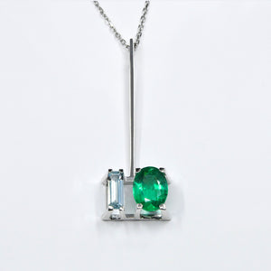 AME EMERALD PENDANT, emerald and aquamarine on 18 carat white gold