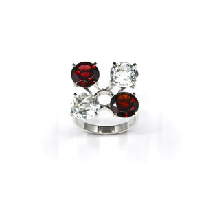 BAGUE FLORE PRINTEMPS, grenats et aigues-marines sur or blanc 18 carats